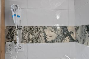 Kúpeľňa v ubytovaní Apartman tutto bene