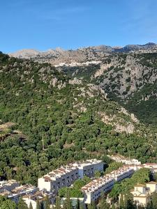 an aerial view of a building on a mountain at El Estudio Lila de Ubrique in Ubrique