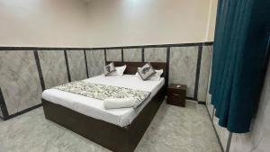 Letto o letti in una camera di Nakshatra palace