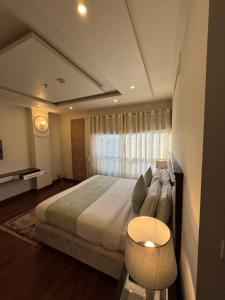 Postel nebo postele na pokoji v ubytování Sintra Hotel