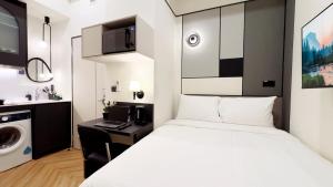 Η κουζίνα ή μικρή κουζίνα στο Coliwoo 288 River Valley - CoLiving +21 φωτογραφίες