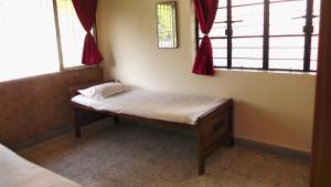 Ένα ή περισσότερα κρεβάτια σε δωμάτιο στο 3BHK hosted by bollywood celebrity