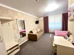 Postel nebo postele na pokoji v ubytování Готель Лаванда