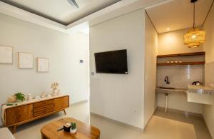 Μια τηλεόραση ή/και κέντρο ψυχαγωγίας στο Baliem CoLiving