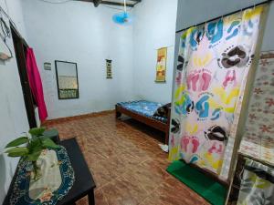 A bed or beds in a room at IjenBromo Hub Omyah Isun Hub