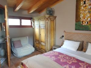 Postel nebo postele na pokoji v ubytování Cascina Trapella