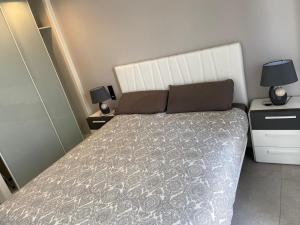 Postel nebo postele na pokoji v ubytování Oasis Beach El Raso Guardamar