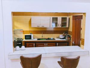 Fotografija v galeriji nastanitve Domicile Cotonou v mestu Cadjèhoun + 4 fotografije