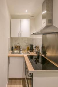 Η κουζίνα ή μικρή κουζίνα στο Studio Cosy - 250m plage +6 φωτογραφίες