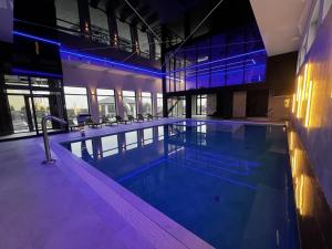 Bazén v ubytovaní Resort Holiday Home Centrum Opieki i Rehabilitacji alebo v jeho blízkosti
