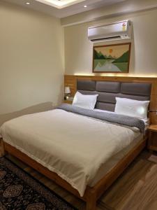 Heryk Hillview Hotel客房内的一张或多张床位