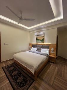 Heryk Hillview Hotel客房内的一张或多张床位