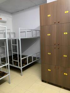 Una cama o camas en una habitación de Raina Tuan Chau
