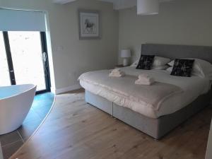 Voodi või voodid majutusasutuse K2Cottages toas