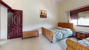 Letto o letti in una camera di Green Paradise
