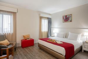 Postel nebo postele na pokoji v ubytování Hotel Estacão - Braga