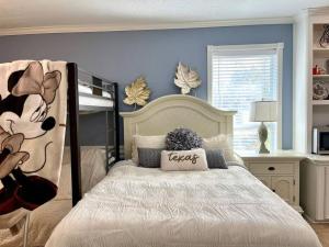 a bedroom with a bed with a pillow on it at Beautiful traditional home*Modern updates*Guest suite B in Katy