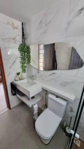 Ένα μπάνιο στο Loft Praia da Tartaruga com Hidromassagem +102 φωτογραφίες