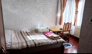 Postel nebo postele na pokoji v ubytování Bujtina (Pension) Oltas