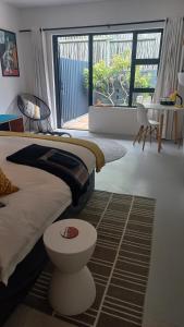 Ένα ή περισσότερα κρεβάτια σε δωμάτιο στο Yellow Door Hermanus