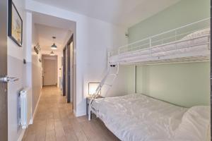 Postel nebo postele na pokoji v ubytování Marmotte 102