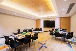 TV o dispositivi per l'intrattenimento presso Hampton by Hilton Guangzhou Zhujiang New Town - Free Shuttle Bus to Canton Fair
