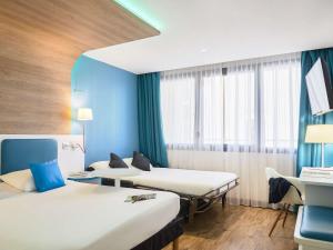 Postel nebo postele na pokoji v ubytování ibis Styles Montelimar Centre + 37 fotografií