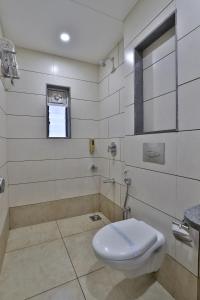 Koupelna v ubytování Hotel Limra Vadodara