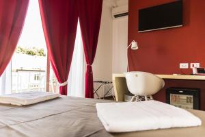 Postel nebo postele na pokoji v ubytování Bio Hotel Palermo