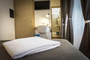 Postel nebo postele na pokoji v ubytování Bio Hotel Palermo