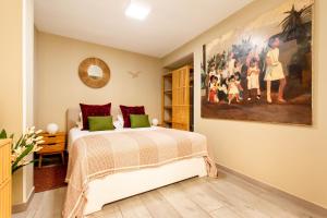 Łóżko lub łóżka w pokoju w obiekcie Tirso Loft en Madrid