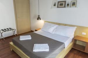 Postel nebo postele na pokoji v ubytování Bio Hotel Palermo