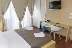 Postel nebo postele na pokoji v ubytování Bio Hotel Palermo