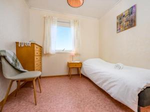 Postel nebo postele na pokoji v ubytování Chalet Seievika by Interhome
