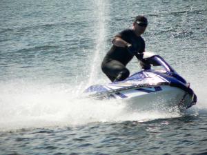 a person on a jet ski in the water at Jetadrenaline Watersports Club in Rewa +28 photos