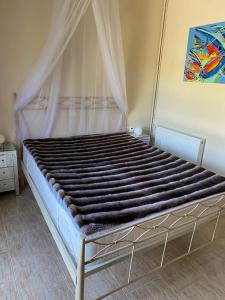 En eller flere senge i et værelse på Anja`s Villa + 11 billeder