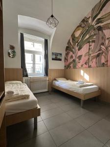 Postel nebo postele na pokoji v ubytování HousingPlus