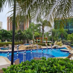 Бассейн в Barra Premium-Flat 1203-4 Praia, Piscina, Academia или поблизости