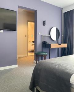 TV a/nebo společenská místnost v ubytování Hotel Botanica