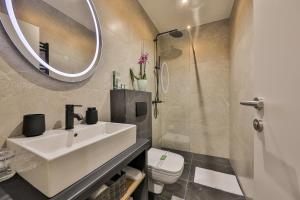 Koupelna v ubytování Hotel Botanica