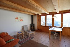 Posezení v ubytování Chalet Les Pyramides