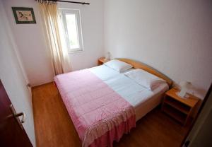 Postel nebo postele na pokoji v ubytování Apartment Vera