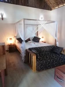 Postel nebo postele na pokoji v ubytování Doany Beach