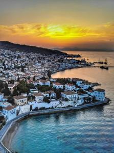 an aerial view of a city at sunset at GDE SPETSES 3bdr HOUSE in Spetses