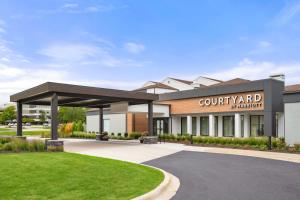 una representación de un edificio de CountyArc en Courtyard by Marriott Detroit Livonia, en Livonia