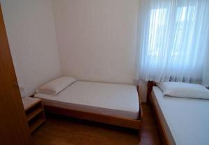 Postel nebo postele na pokoji v ubytování Apartment Vera
