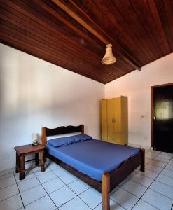 Postel nebo postele na pokoji v ubytování Casa em Ilhabela