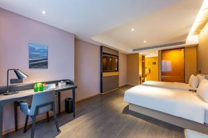 Katil atau katil-katil dalam bilik di Atour Hotel Beijing Panjiayuan Shilihe