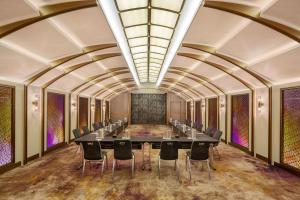 a conference room with a long table and chairs at W Bangkok Hotel in Bangkok +37 photos