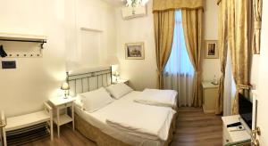 Posteľ alebo postele v izbe v ubytovaní Villa Casanova
